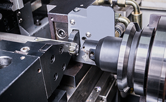 铣端面钻中心孔机床+桁架式机器人